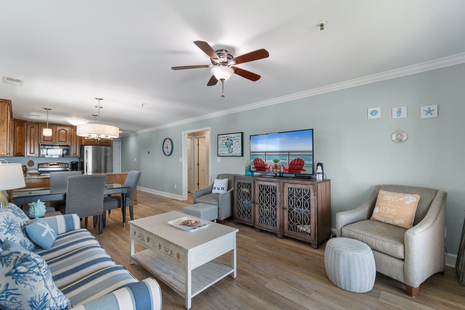 Living room toward open kitchen and dining area showing full open-concept layout, Surfwatch 3 Unit 305, Surfside Beach