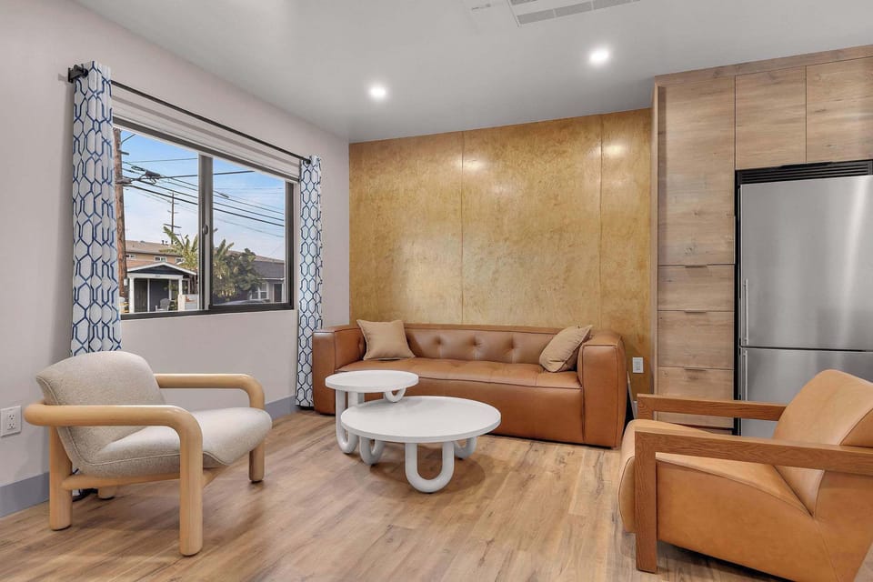🥂 Whether you're enjoying your morning coffee or winding down at night, this inviting living room provides a comfortable place to relax together.