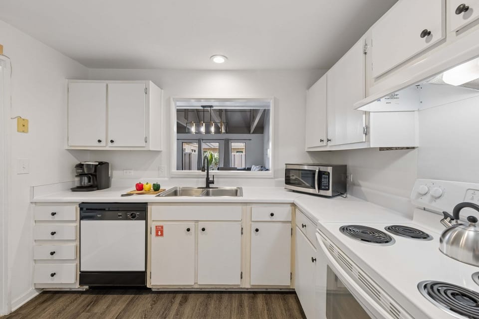 Includes a Keurig for slow island mornings and a dishwasher for fast evening cleanups.