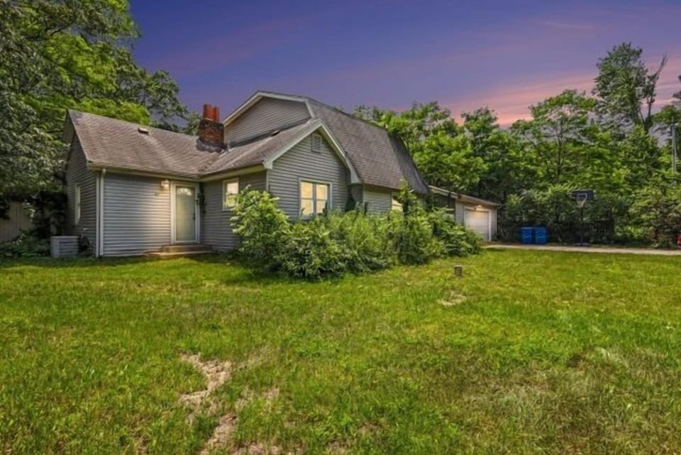 Front of the home at dusk. 