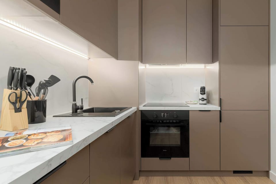 The kitchenette's practical layout maximizes space and functionality.