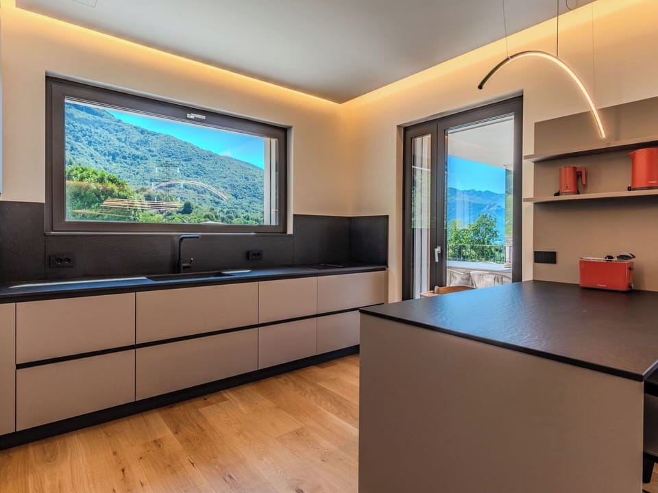 Interior Design, Kitchen, Countertop, Flooring, Wood, Furniture, Ceiling, Light Fixture, Home, Cabinetry