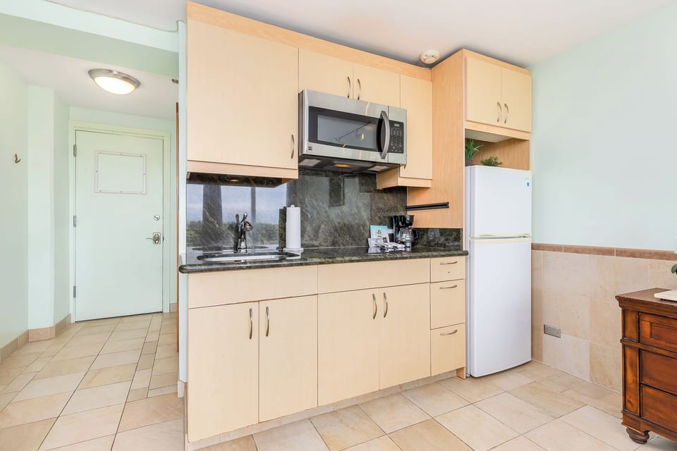 Your bright, well-equipped kitchenette has everything you need for easy meal prep, with sleek counters, modern appliances, and cheerful decor to make you feel at home.