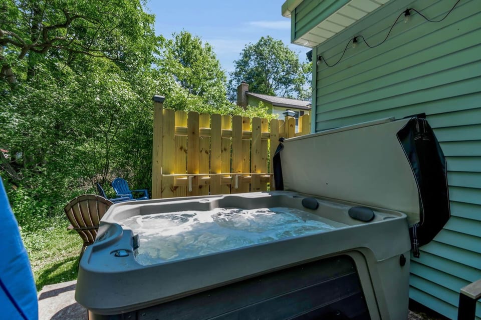 Relax in the private hot tub after skiing, hiking, or exploring Ellicottville