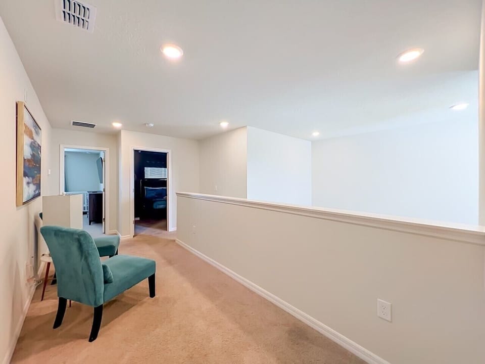 Bright upstairs loft and hallway providing easy access to the bedrooms and extra living space.