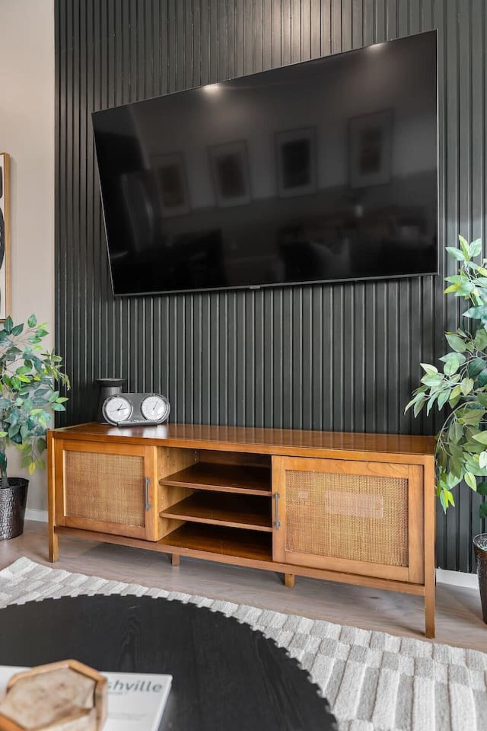 Open concept from the kitchen and dining area into the bright and spacious living with comfortable seating and lots of natural light. Smart TV with all the streaming apps you could want. The couch turns into a sleeper sofa.