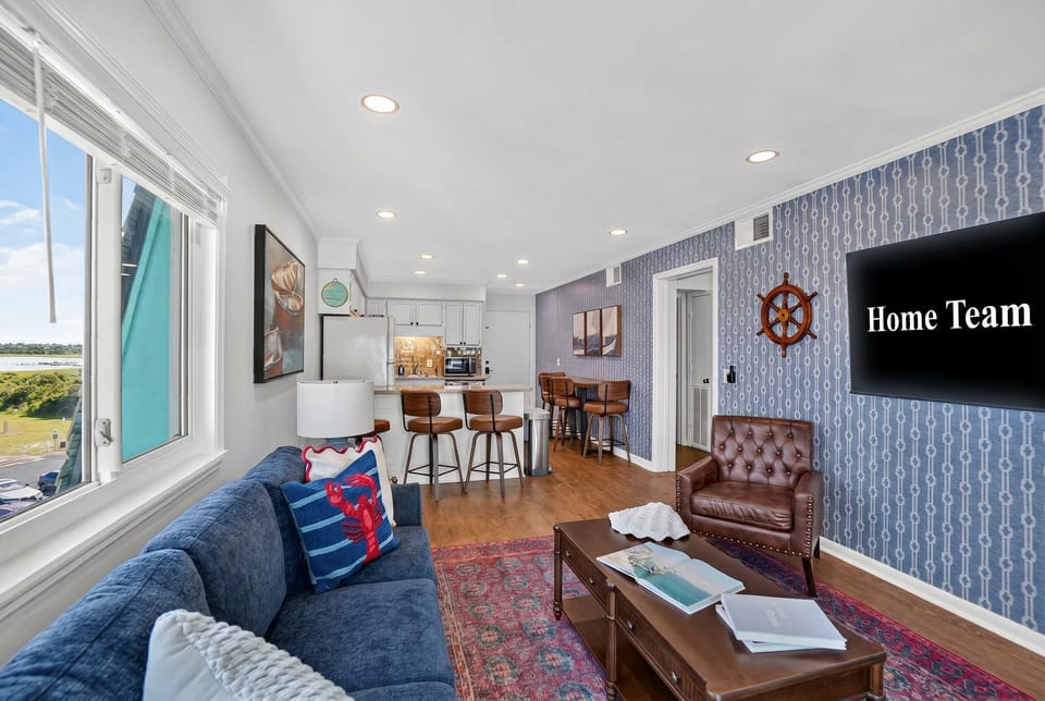 Big on comfort, even bigger on good vibes. Whether you're catching up or kicking back, this living room is made for it all.
