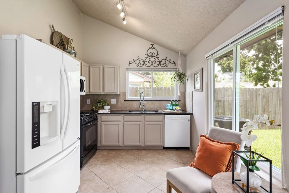 Fully equipped kitchen. Enjoy a bright, vaulted space complete with modern appli