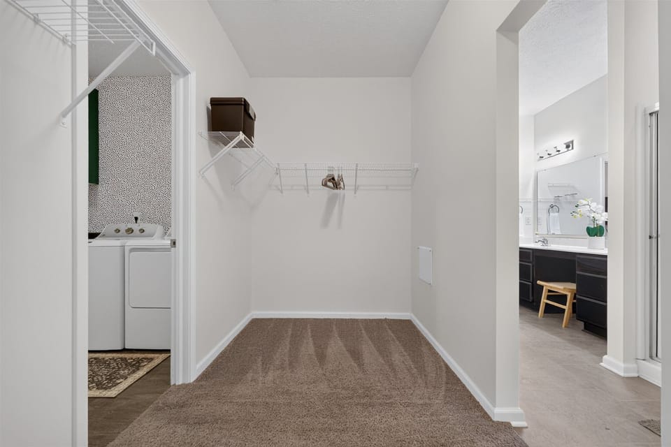 Primary Bedroom Closet / Laundry Room Access