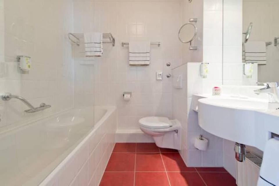 Refresh with a relaxing bath and spotless vanity space.