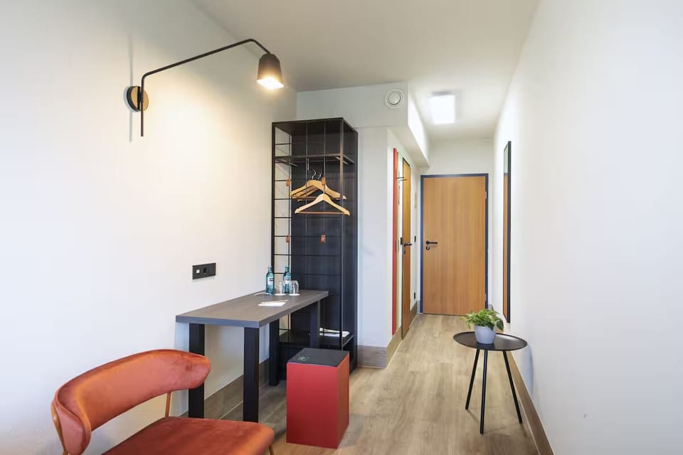 Plan your day at the simple desk with open storage.