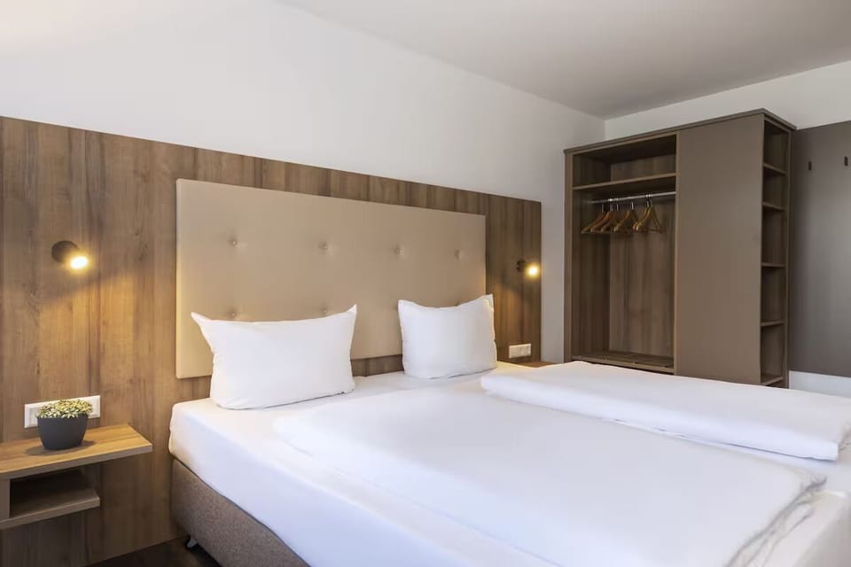 Sink into plush pillows and enjoy a peaceful night’s sleep.