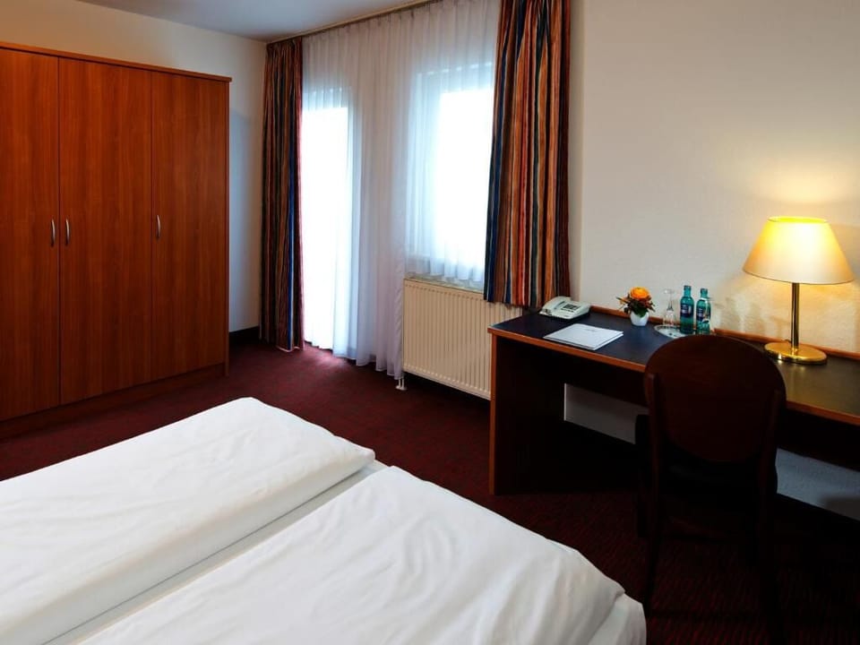 Settle in with ample storage and a practical work desk.