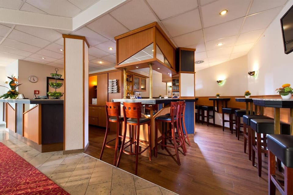 Sip a drink at the stylish bar and settle in.