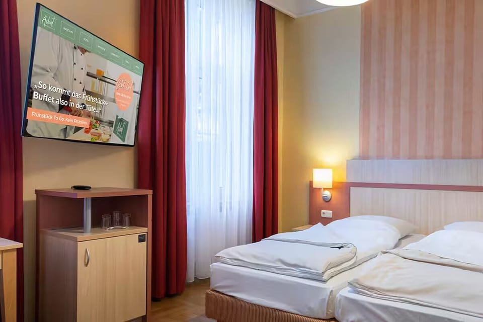 Kick back with in-room TV and easy, restful comfort.