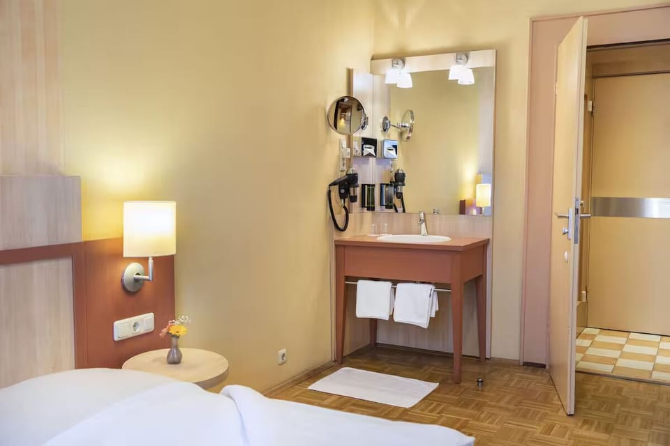 Wake up refreshed in a serene room with thoughtful details.