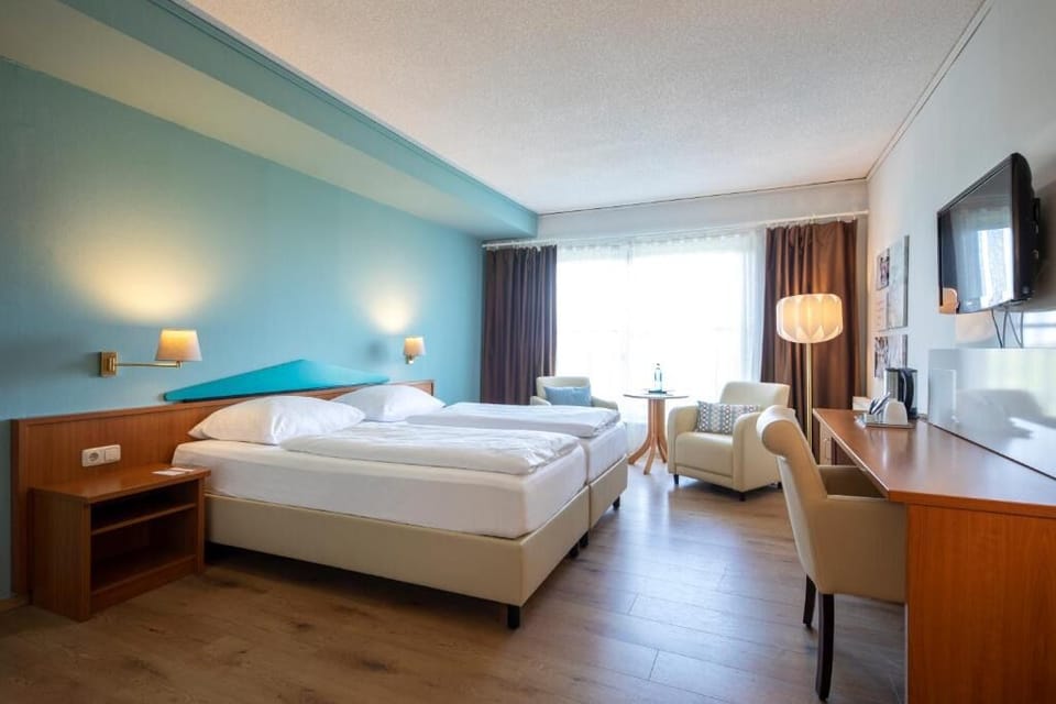 Stretch out in a spacious room with lounge seating and TV.