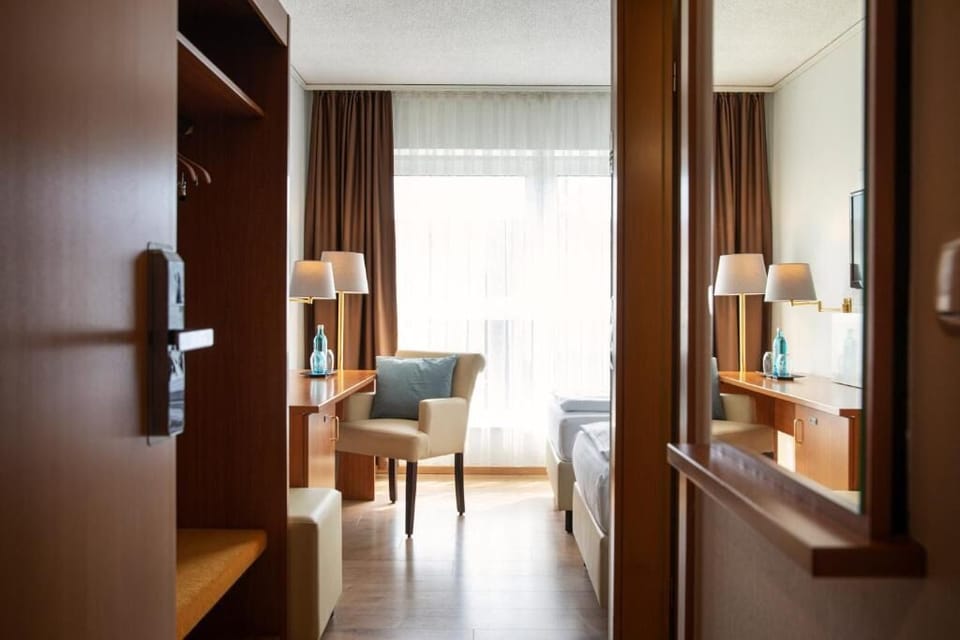 Step into a calm, organized room with generous storage.