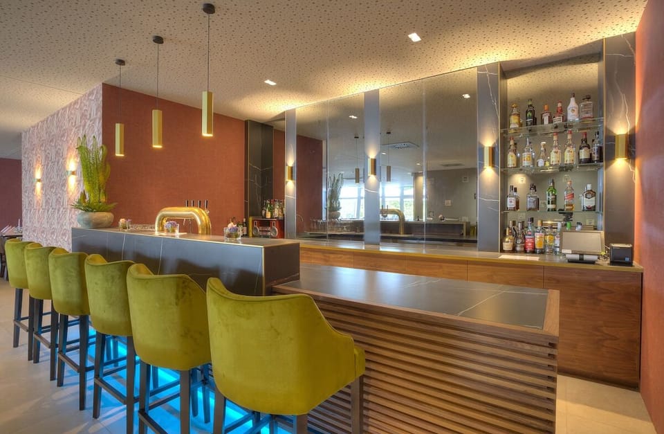 Settle in with a cozy lamp-lit workspace and refreshments.