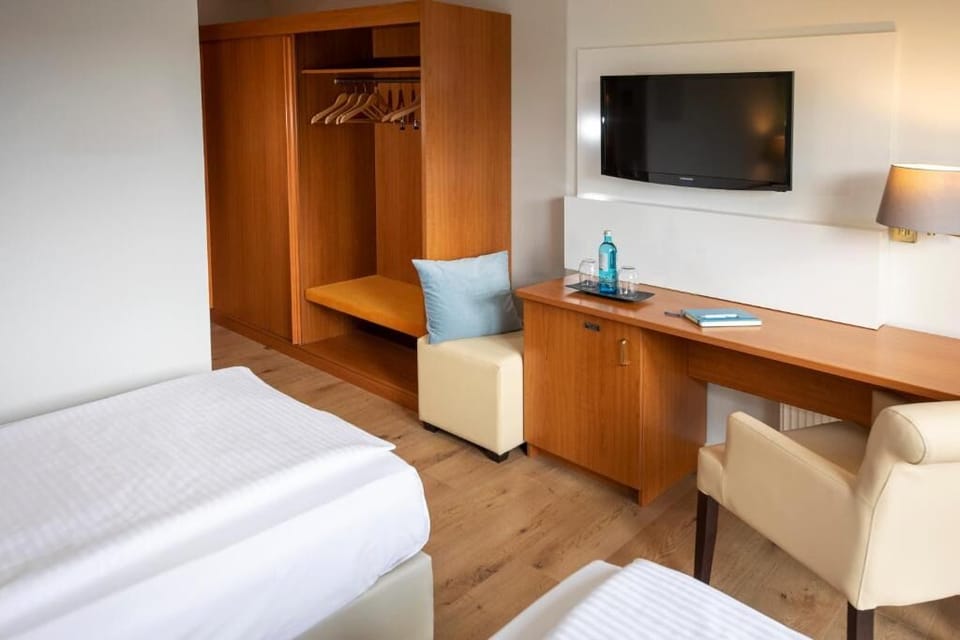 Settle in with a roomy desk and easy TV time.