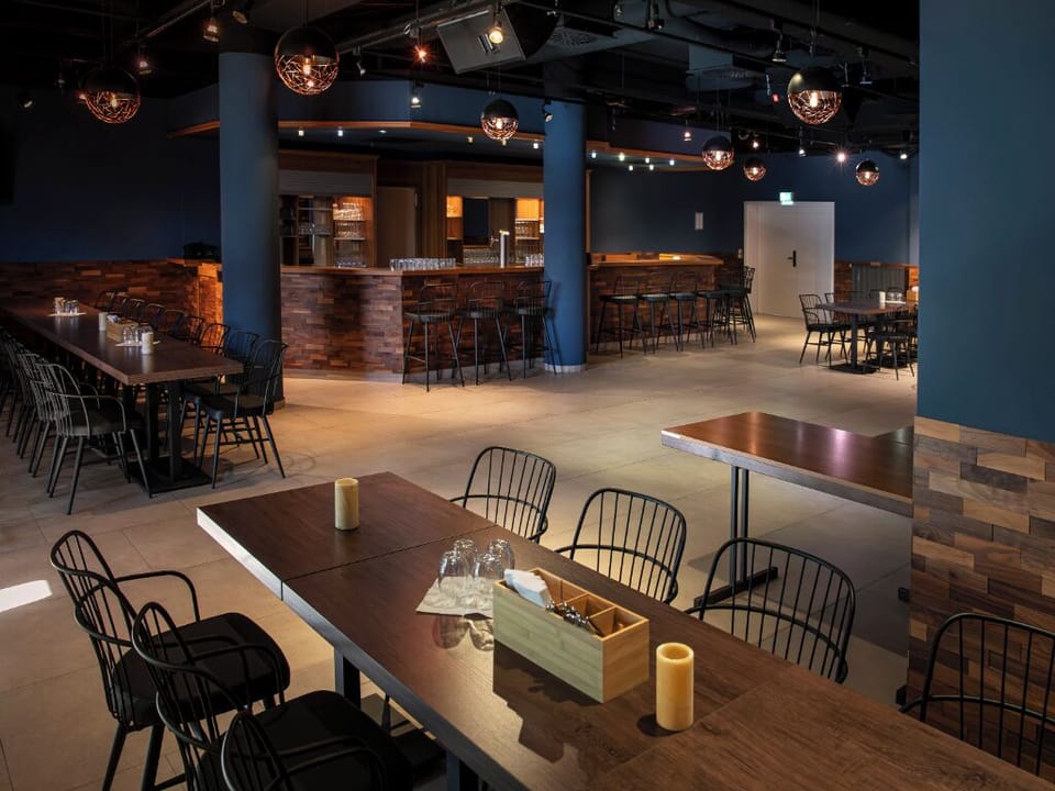 Unwind in a moody lounge with crafted drinks and conversation.