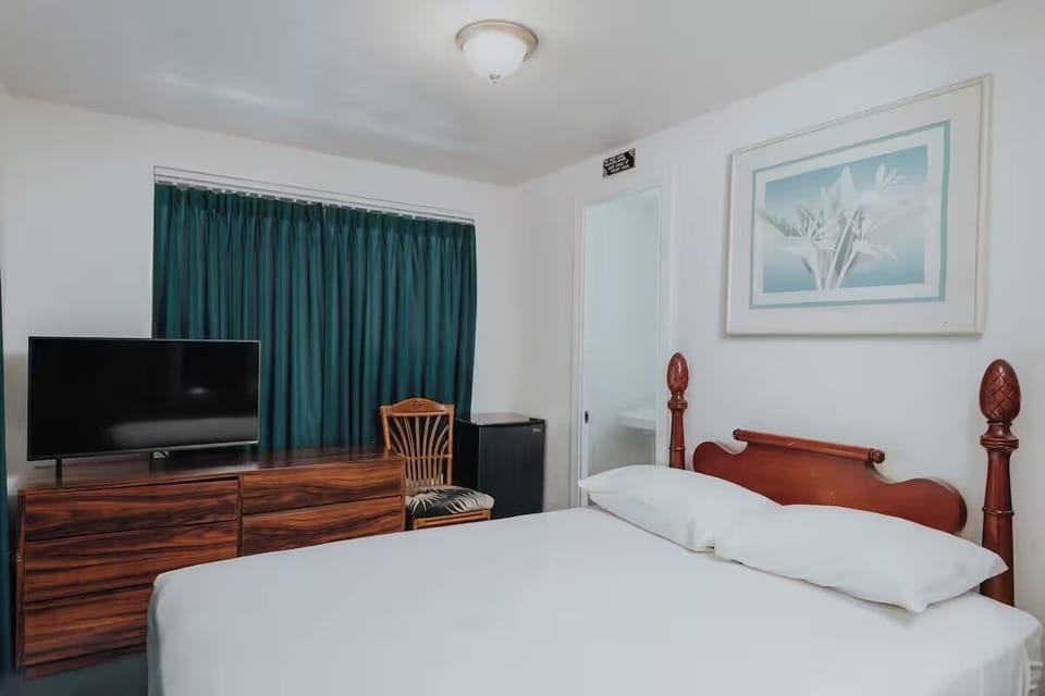 Drift off peacefully in a classic room with cozy furnishings.
