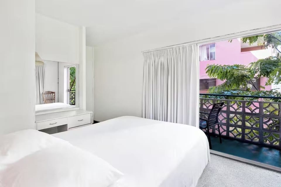 Wake up to greenery outside and sip coffee on the balcony.