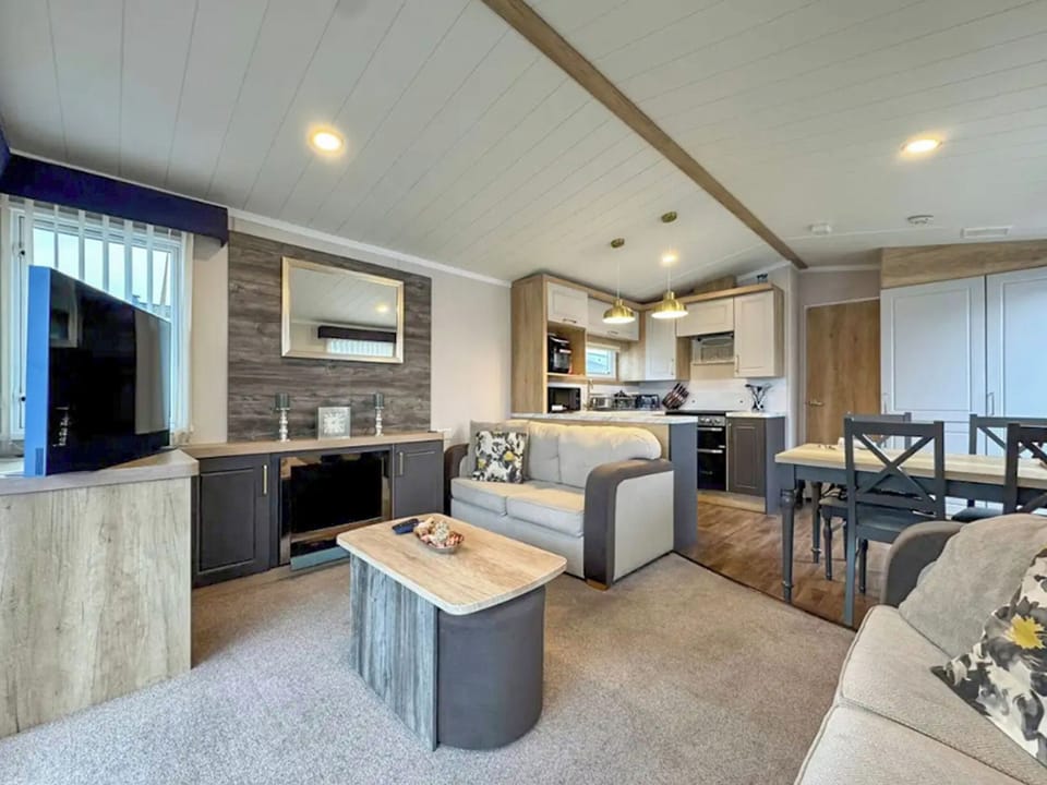 Open plan living space | Swift Bordeaux Escape - North Wales Holidays, Towyn