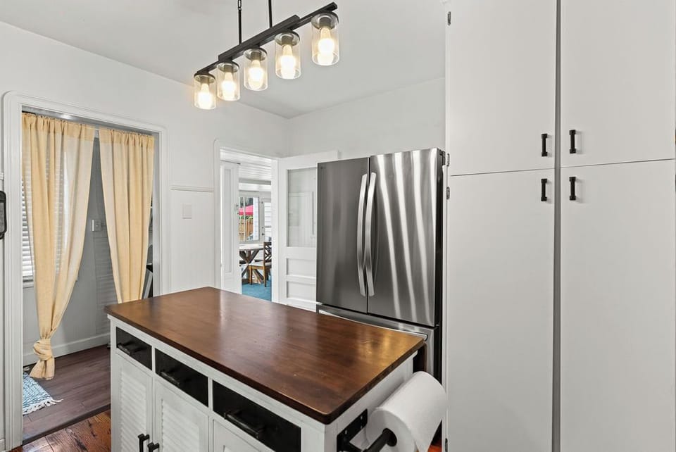 Move effortlessly between the kitchen and the surrounding living spaces, keeping everyone connected whether you're grabbing a snack or relaxing.