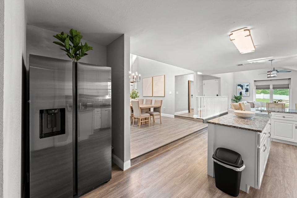 The open-concept layout keeps everyone connected, whether you're cooking, dining, or relaxing in the living room.