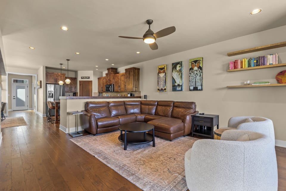 Sink into plush seating and let the open, inviting layout make you feel instantly at home. With stylish touches and a seamless flow to the kitchen, this is your perfect gathering spot.