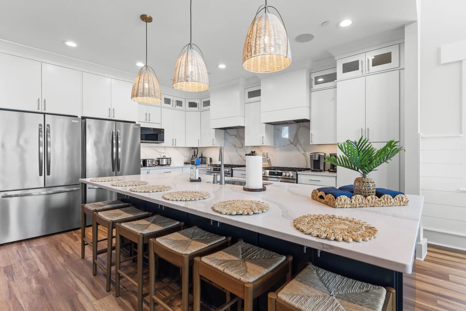 A chef's dream kitchen with a spacious island and double appliances for groups.
