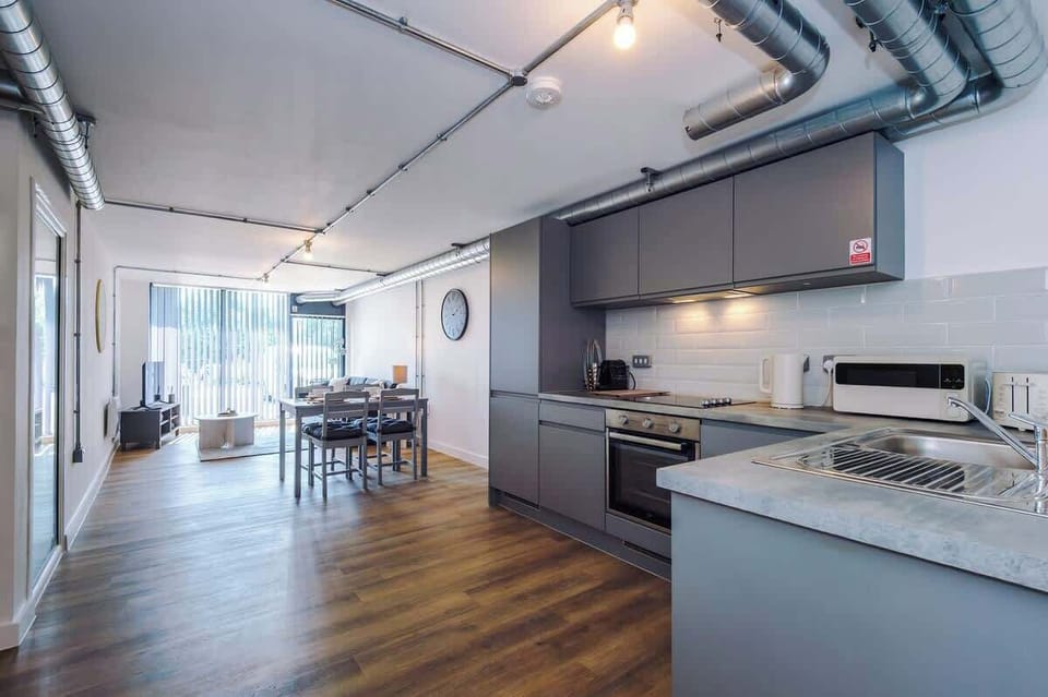 Enjoy a modern, well-equipped kitchen with fitted appliances and ample worktop space.
