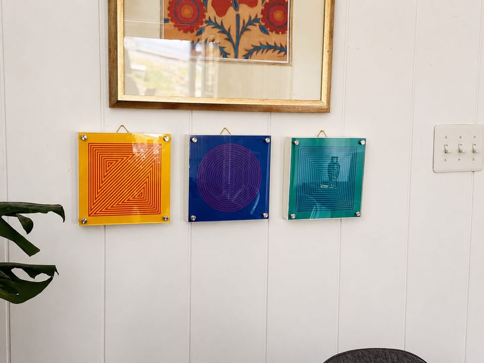 Bright, artistic touches add personality and charm to the dining area.
