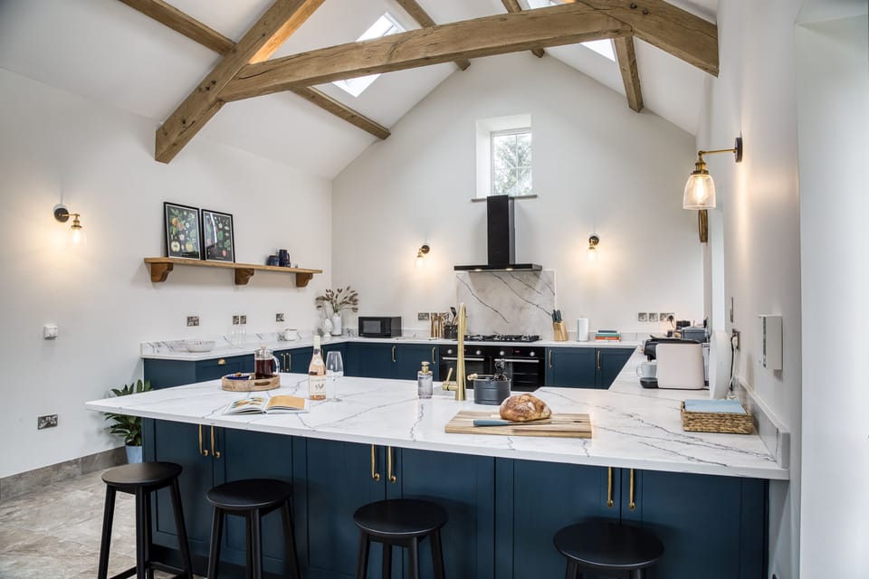 The spacious kitchen area features a large island with seating