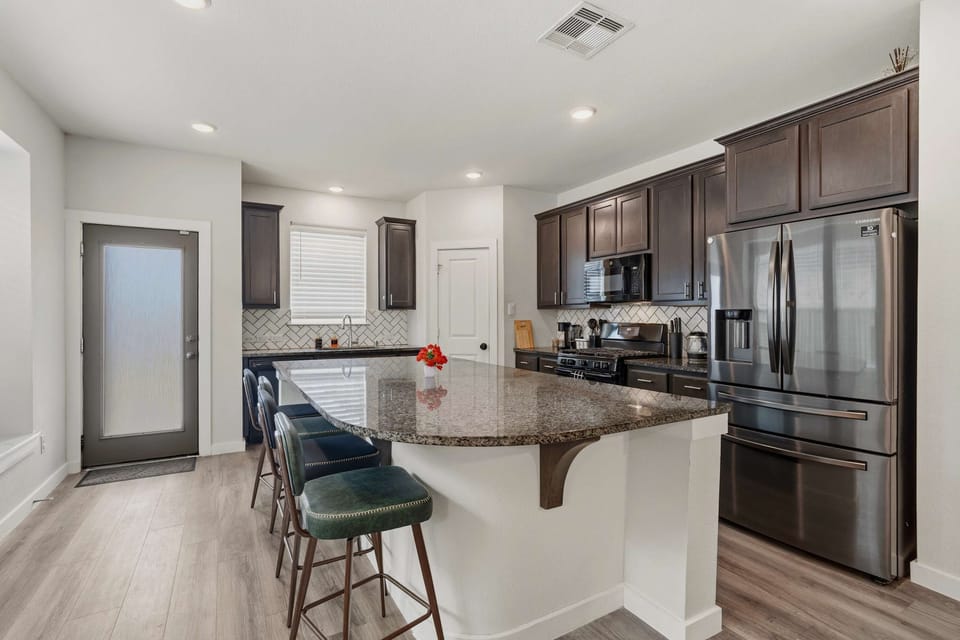 [Kitchen] Sleek, open & fully equipped kitchen - designed for comfort & style and a huge Island top