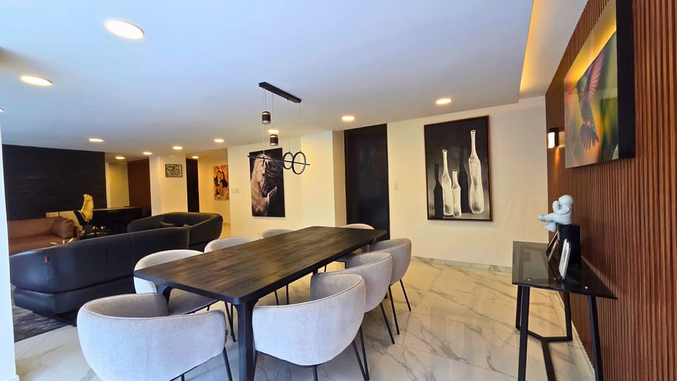 Stylish open dining and lounge space with modern design and upscale finishes