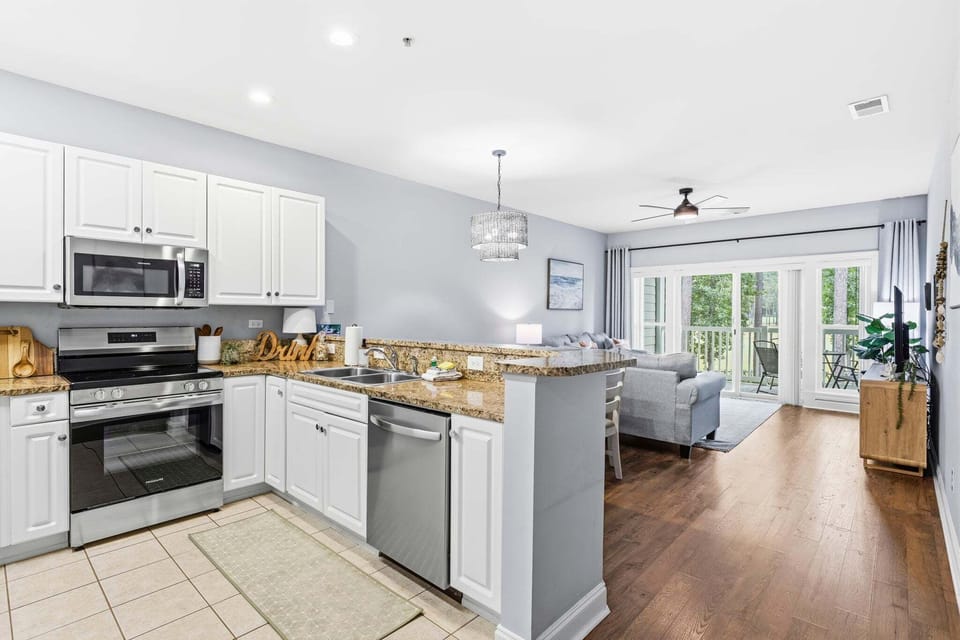 The open kitchen and living space welcomes conversations over prepping meals.