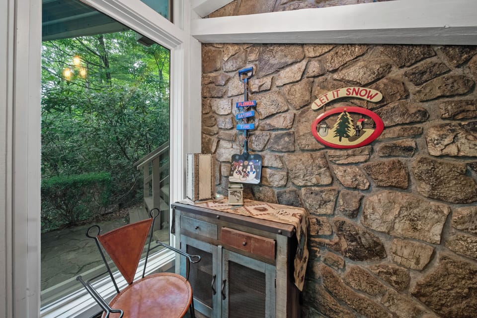 Lower Level Entrance Mud Room with Stone Accent Wall
