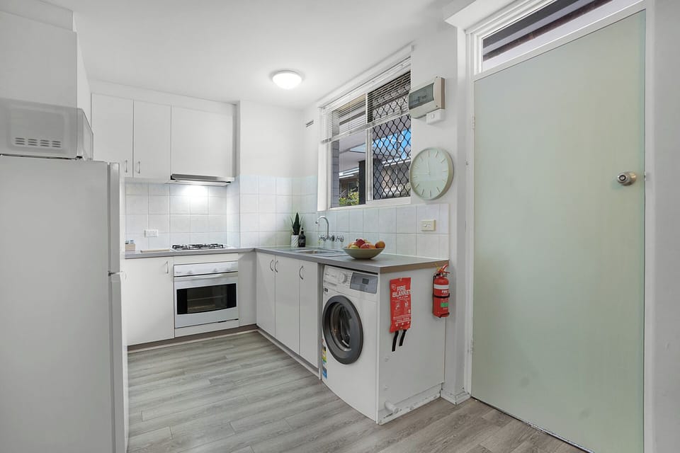 Convenient kitchen and in-unit laundry, perfect for short or extended stays.