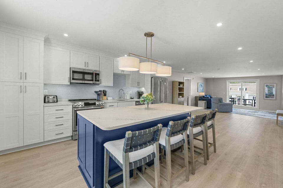 Open concept kitchen, dining area, and living room