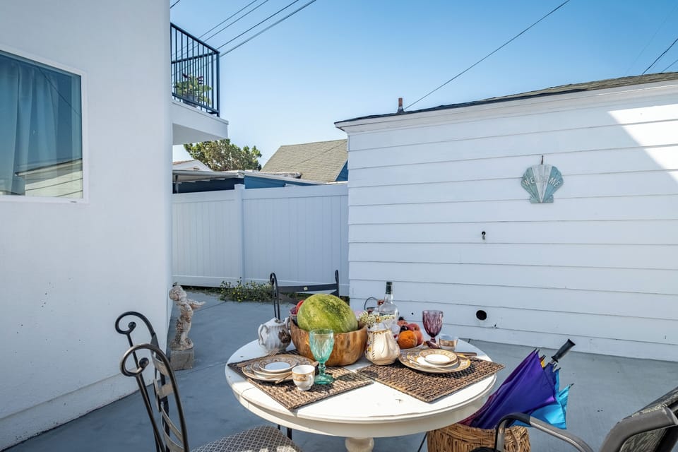 Gather around this outdoor dining table with seating for the whole family