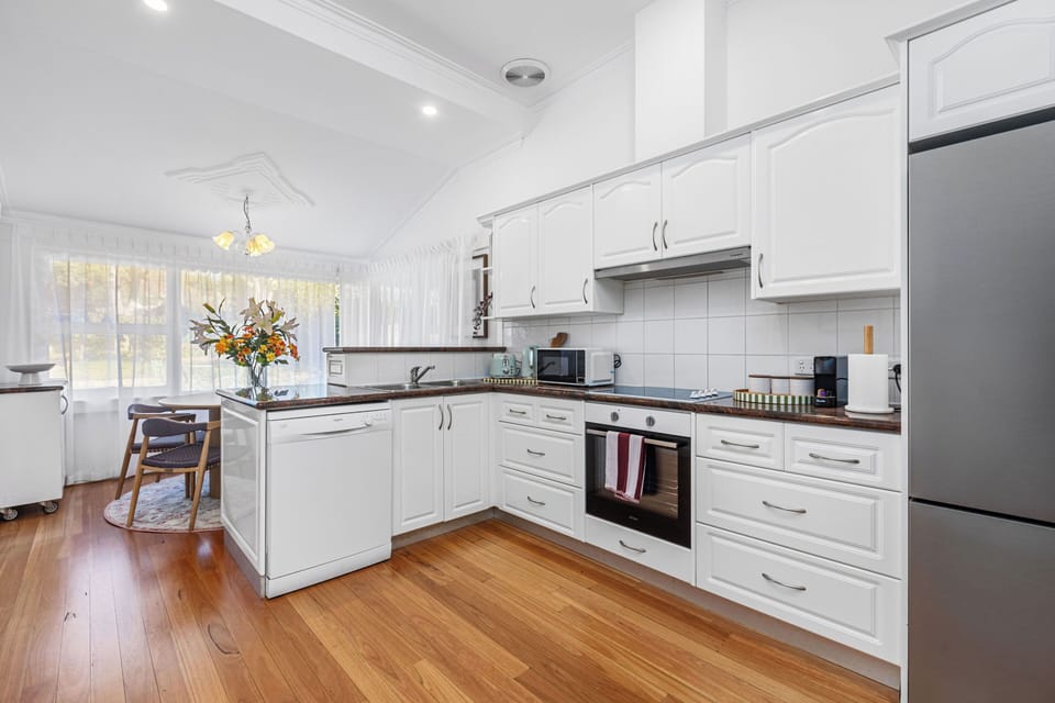 A clean, spacious, and functional kitchen ready for you to cook your favorite meals during your stay.