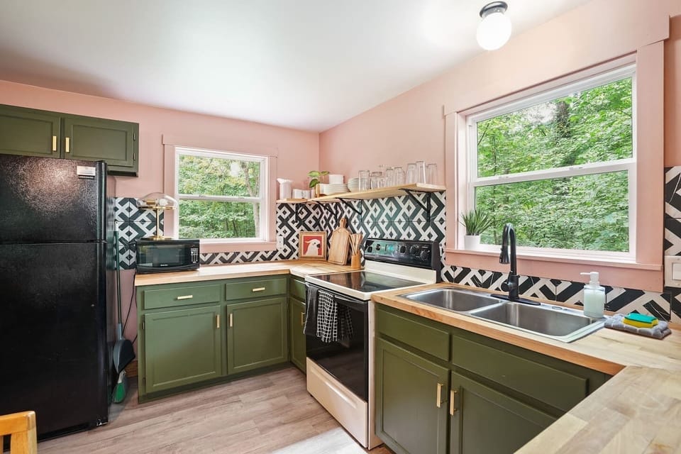 Full kitchen with modern appliances and ample counter space