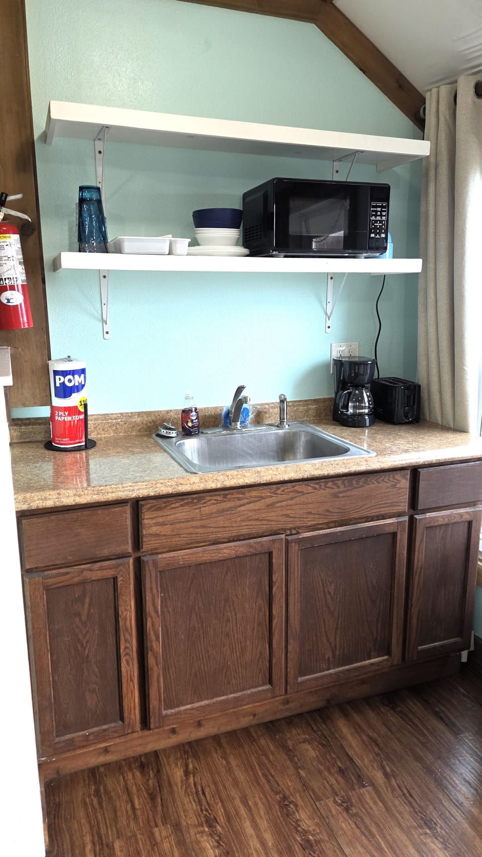 There is also a microwave over and drip coffee maker