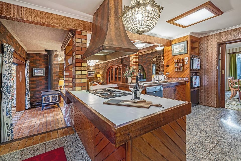 Gather beside the fireplace as its gentle warmth creates the perfect backdrop for cool evenings spent together indoors.