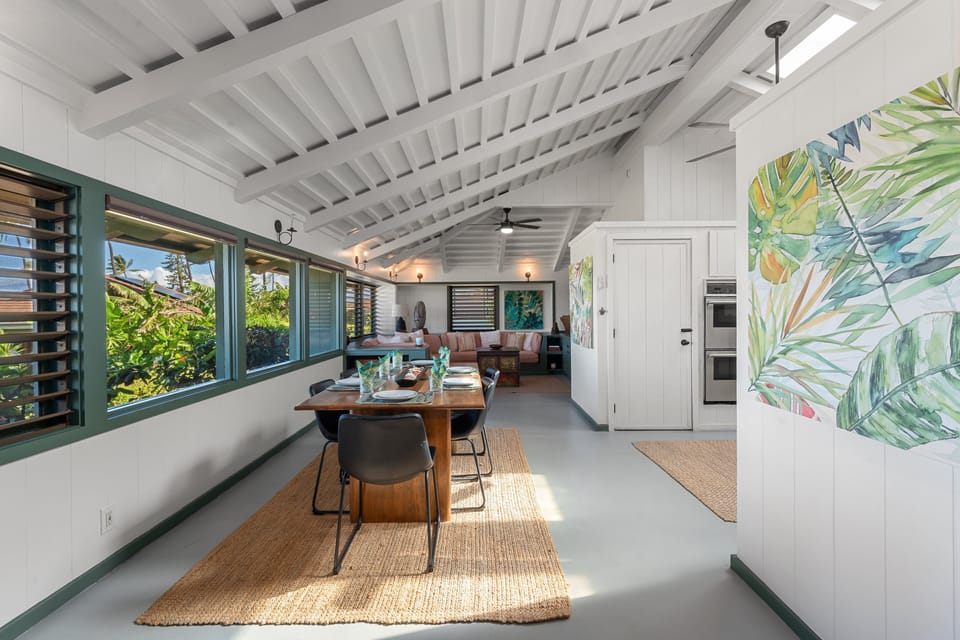 Thoughtfully designed great room with comfortable spaces for dining, relaxing, and entertaining.