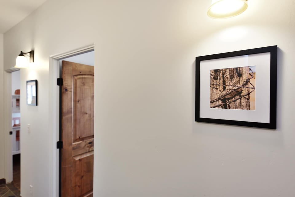 The hallway connects three of the bedrooms and the bathroom. 