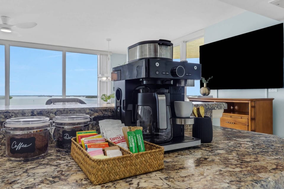 Create your perfect morning—brew your favorite coffee, settle in by the window or on the balcony, and watch Estero Bay come to life.