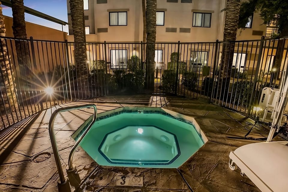 Cool off anytime in the sparkling pool with easy access.